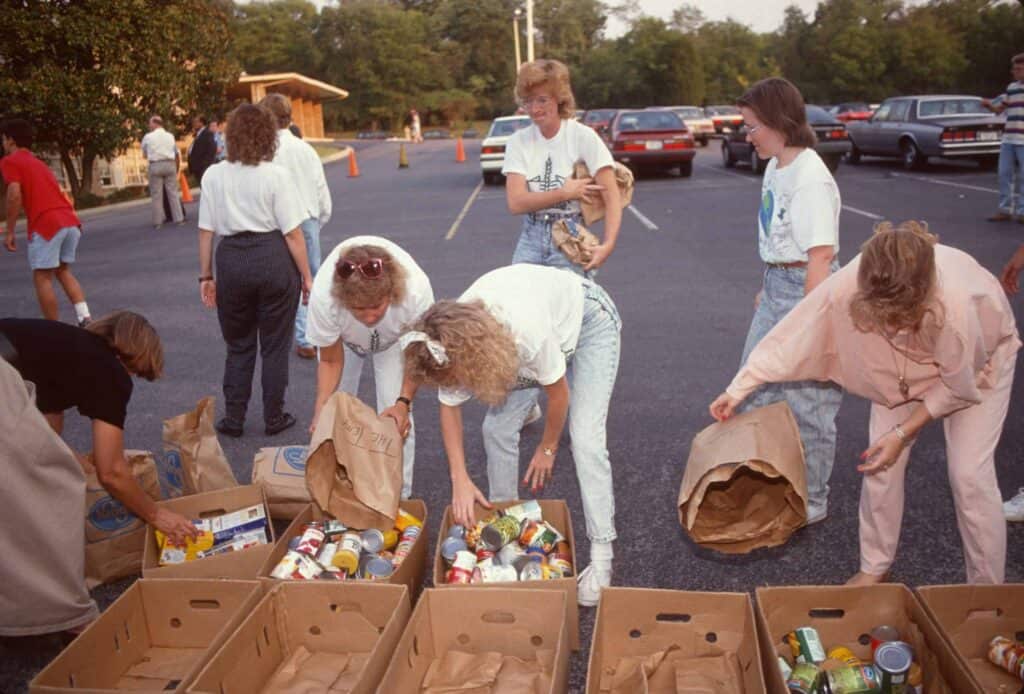 Volunteers collecting non-perishable donations.